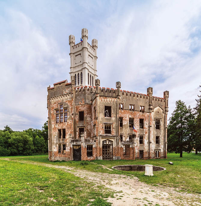 Ruins of state castle, Cesky Rudolec, Castle is also known as Small famous White castle Hluboka, sunny day with blue sky. The Infinite Beauty Of Decay